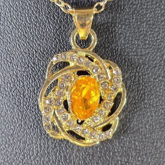 2/$20 Rhinestone Swirl Pendant Necklace With Yellow Rhinestone Center (NWOT) - Picture 2 of 5